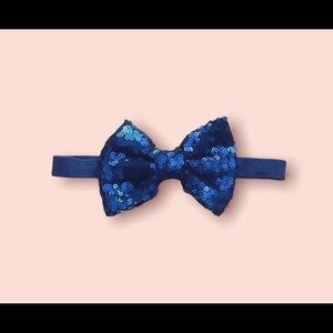 Navy blue holiday sequined bow